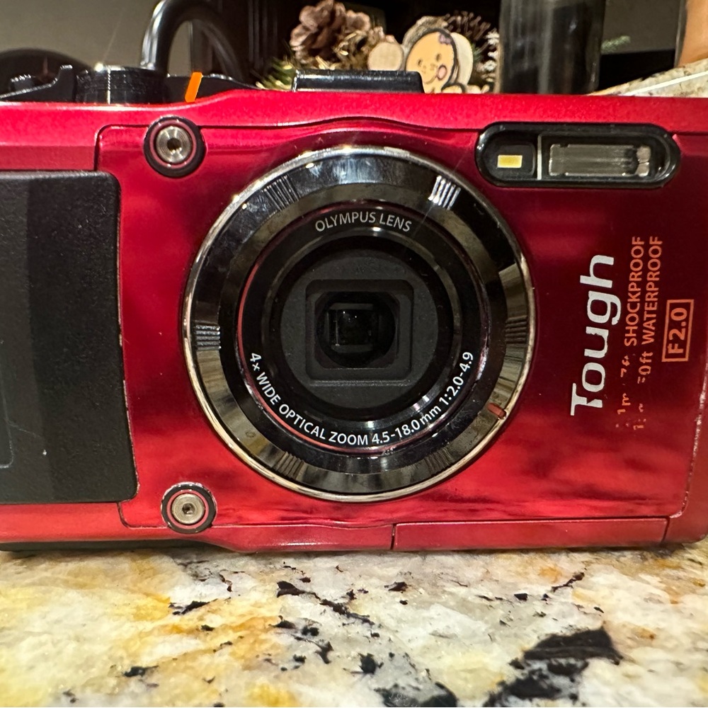 Olympus TG3 Waterproof 16 MP Digital Camera and accessories